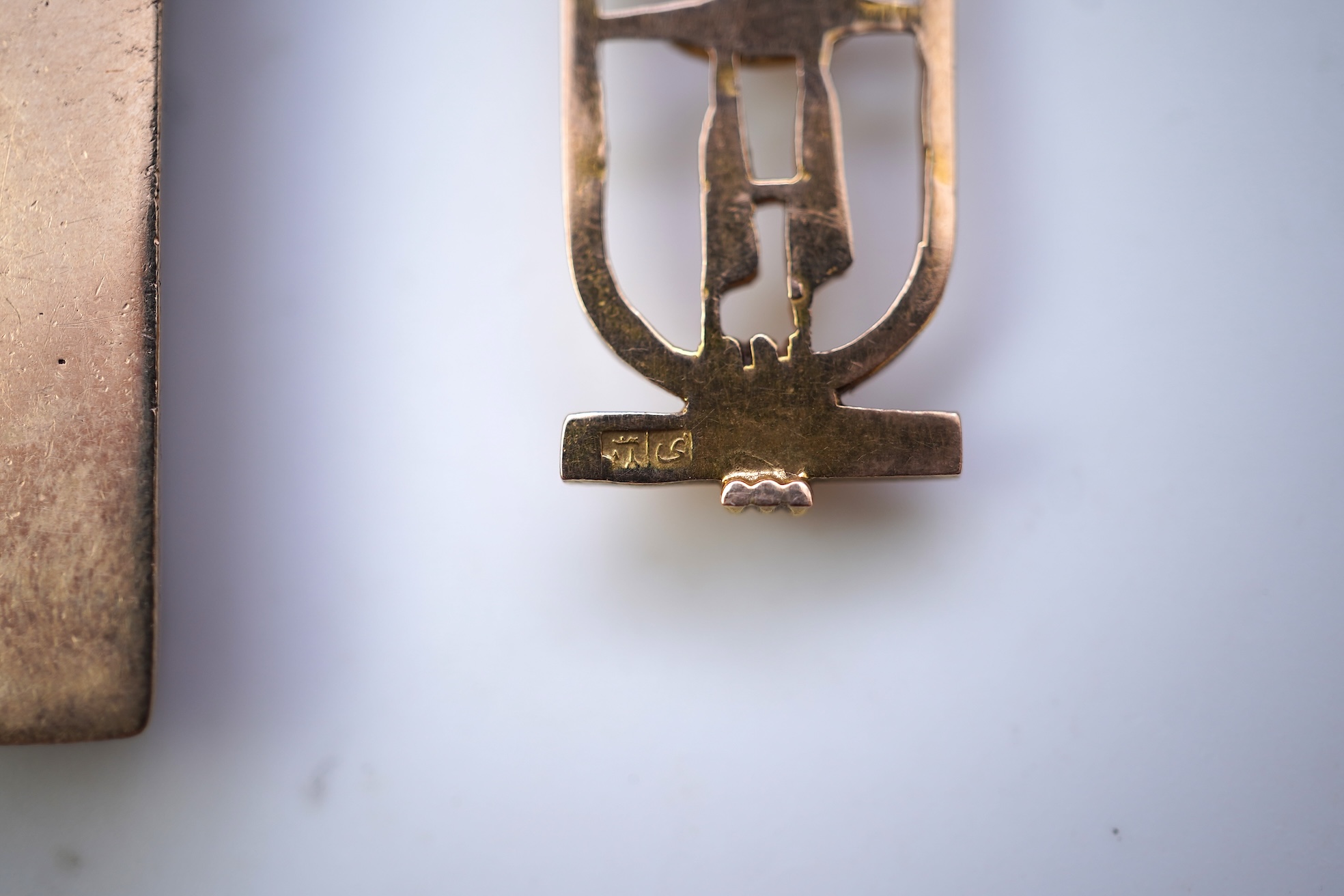Two gold pendants